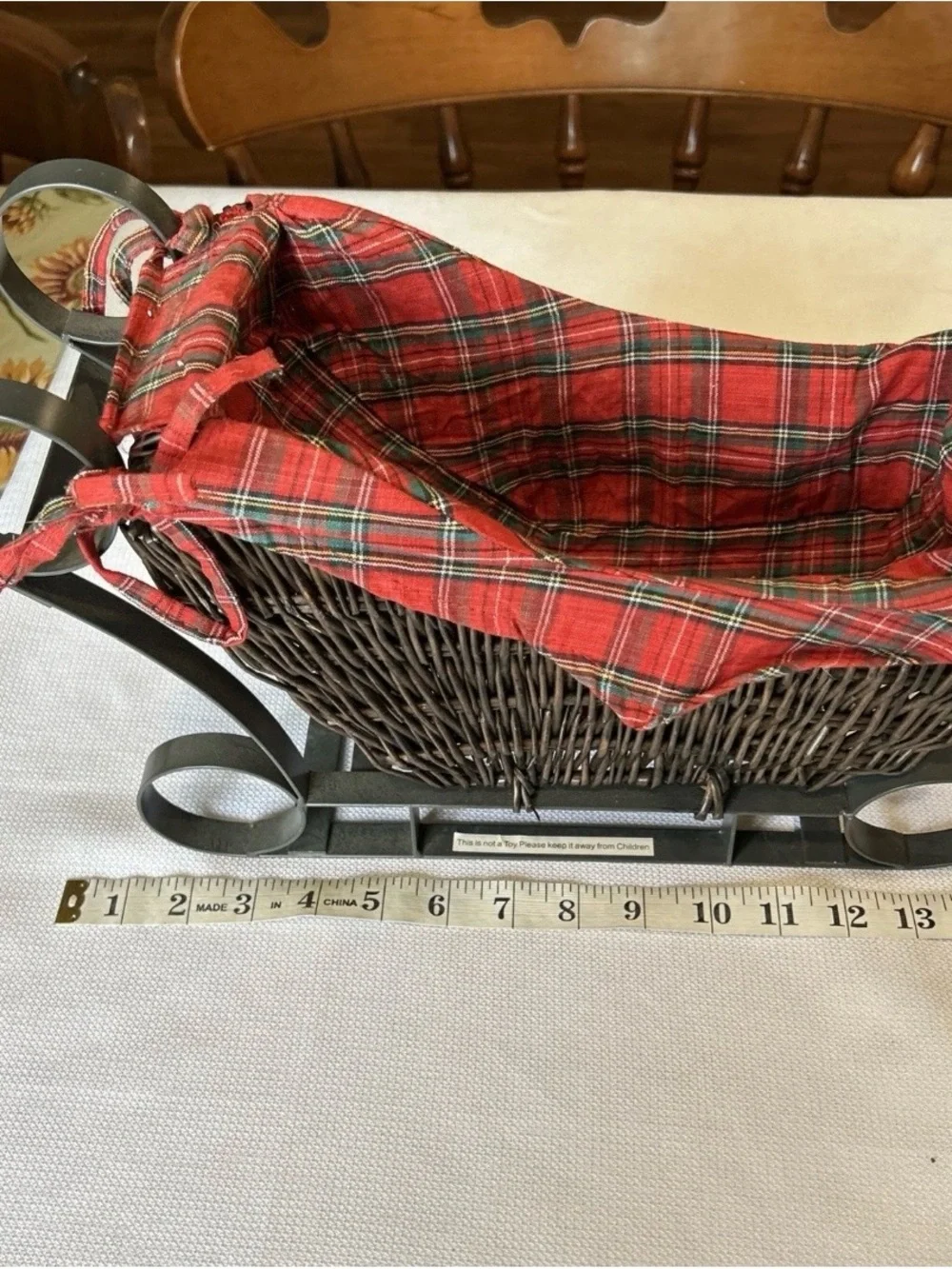 Rustic Wicker Sleigh Basket with Red Plaid Liner Metal Runners